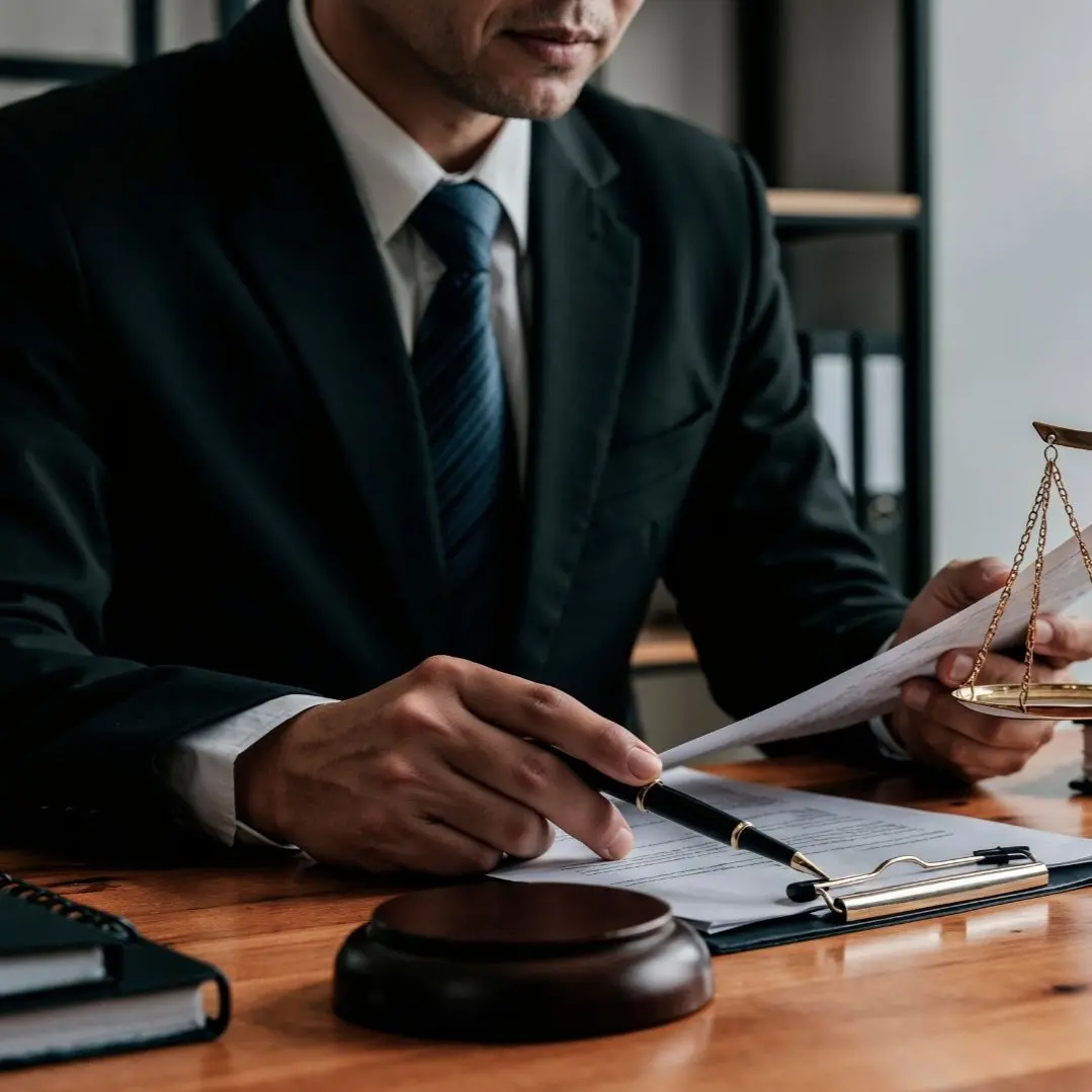 Collaborative divorce attorney in Syracuse, NY reviewing divorce documents and settlement terms